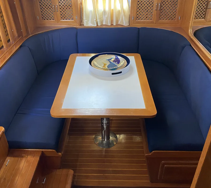 Boat dinette rebuilt in blue marine upholstery