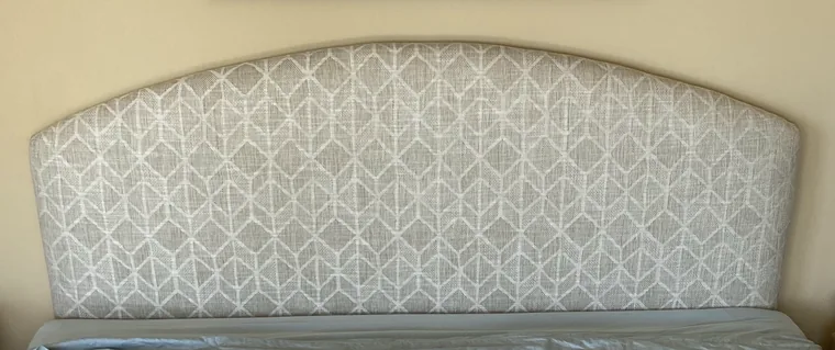 Arched headboard in a geometric print