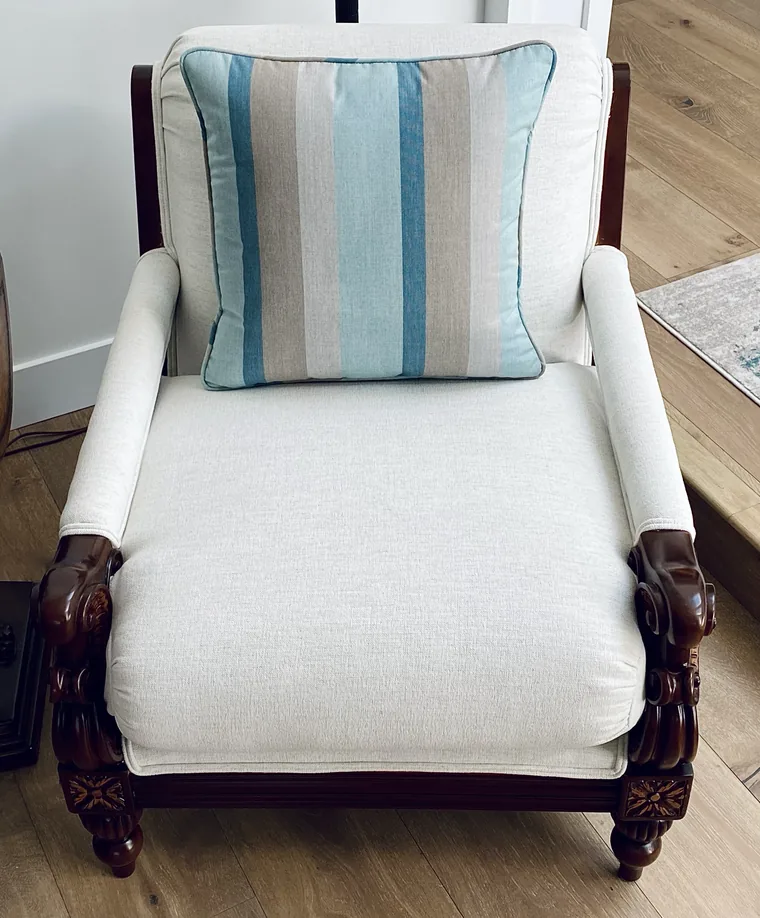 Carved-frame armchair recovered in cream linen