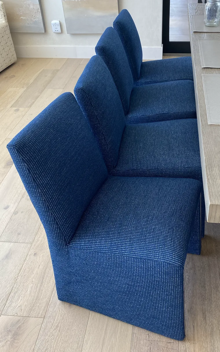 Dining chairs recovered in a blue texture