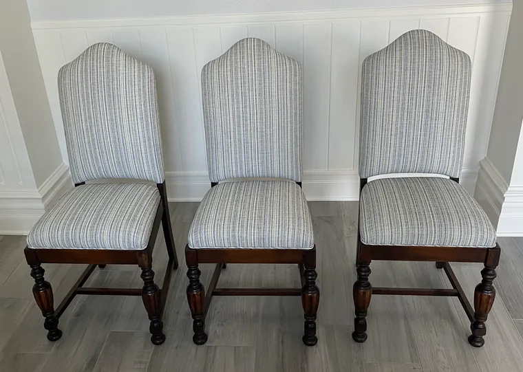Dining chairs recovered in an oatmeal stripe