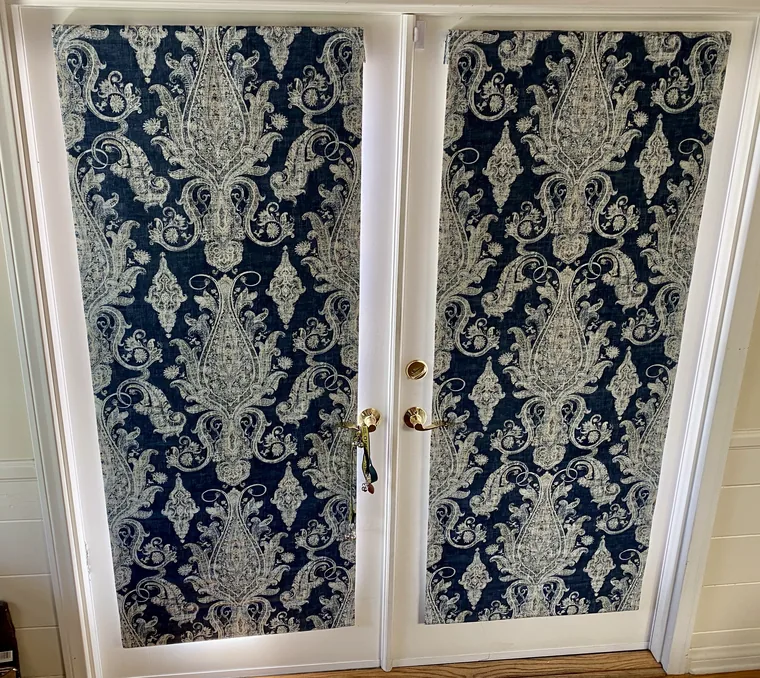 French-door drapery panels in navy damask