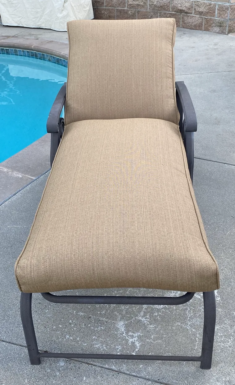 Poolside chaise lounge with new outdoor cushions