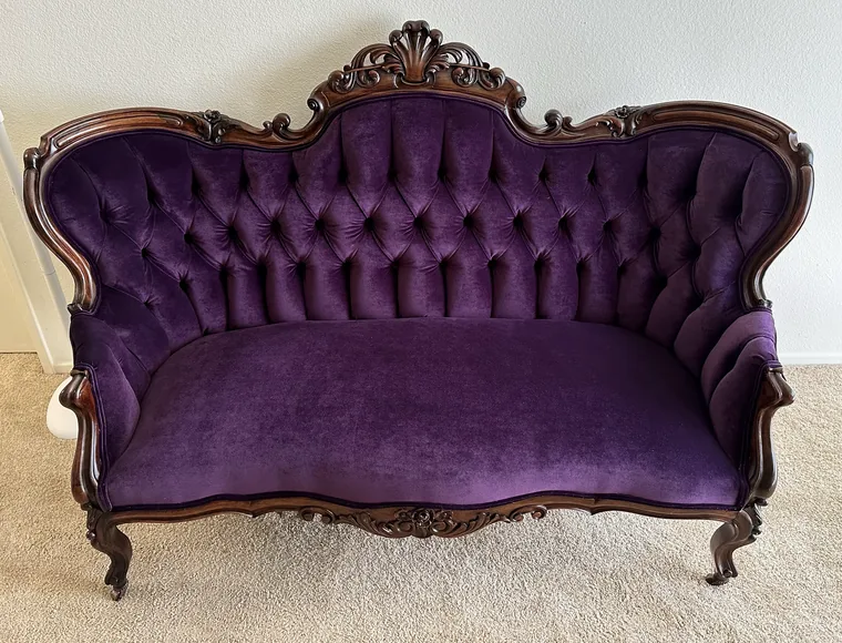 Victorian settee restored in purple velvet on a carved walnut frame
