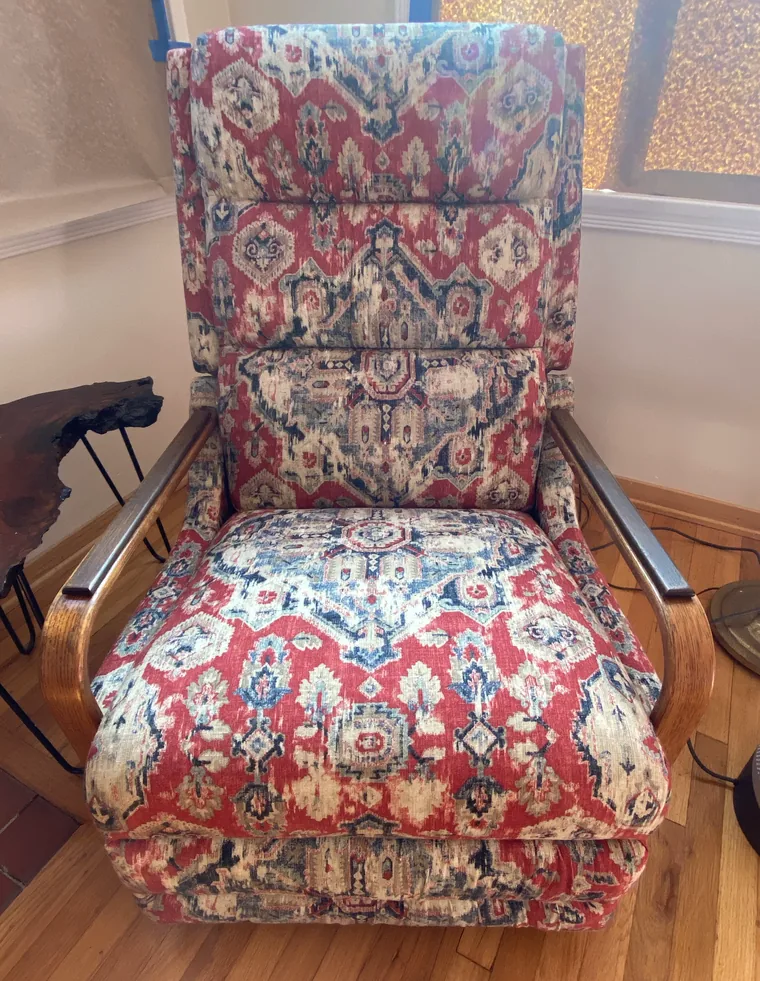 Wing chair recovered in a kilim print